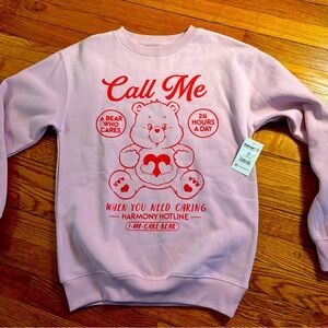Pink Sweatshirt with Red Care Bears Graphic
Meas pit to pit=18
Top to bottom 24
